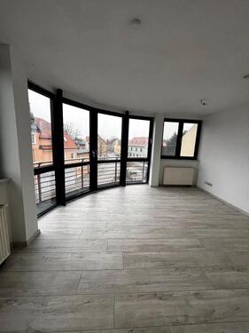 Foto - Helle 2-Zimmer-Wohnung im DG mit Markt-Blick & Stellplatz