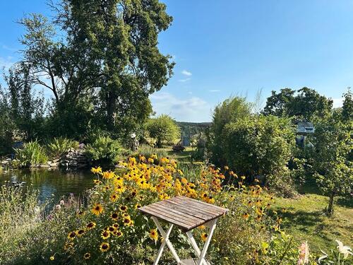 Foto - Ein Zuhause mit großem Naturgarten und biologischem Schwimmteich