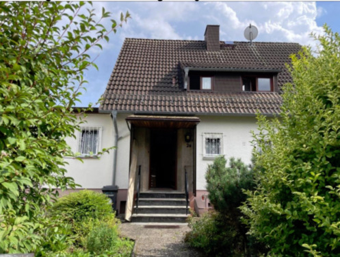 Foto - Freistehendes Einfamilienhaus mit Garage
