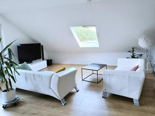 Foto - Wohnen mit Aussicht – stilvolle Dachgeschosswohnung mit Schlossbl