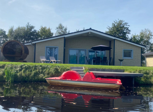 Foto - Ferienhaus am See (1 bis 8 Personen) mit eigenem Tretboot und Panorama Außensauna