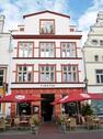 Foto - Geschäftshaus mit 3 Gewerbeeinheiten : Cafe, Pension und Friseur
