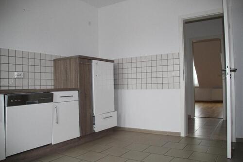Foto - Großzügige 2,5-Zimmer-DG-Wohnung mit EBK und Kaminofen - Ab sofort