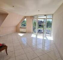 Charmante 4-Zimmer-Dachgeschosswohnung mit Garage - Holzminden