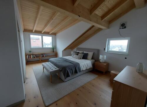 Foto - Lichtdurchflutetes Dachgeschoss mit offenem Wohnen und separater