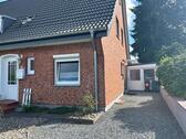 Foto - Erdgeschosswohnung mit kleinem Garten in 25712 Burg zu vermieten