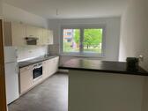 Foto - neuer Grundriss mit großem Bad und Einbauküche