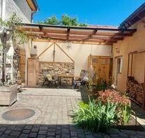 Freistehendes Einfamilienhaus - 330.000,00&nbsp;EUR Kaufpreis, ca.&nbsp; 74,90&nbsp;m&sup2; in Osthofen (PLZ: 67574)