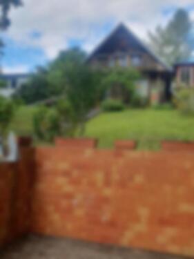 Foto - Grundstück mit Holzhaus am See - 450.000,00 EUR Kaufpreis,