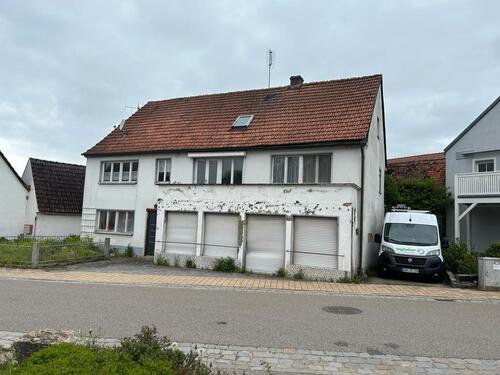 Foto - Mehrfamilienhaus + Geschäftsladen 