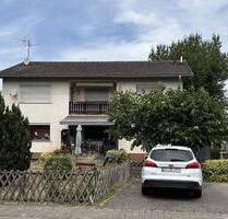 Zweifamilienhaus in Wöllstein: EG vermietet, 1. OG bezugsfrei