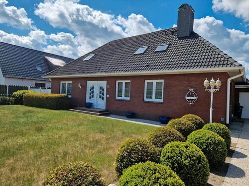 Foto - Einfamilienhaus mit Einliegerwohnung