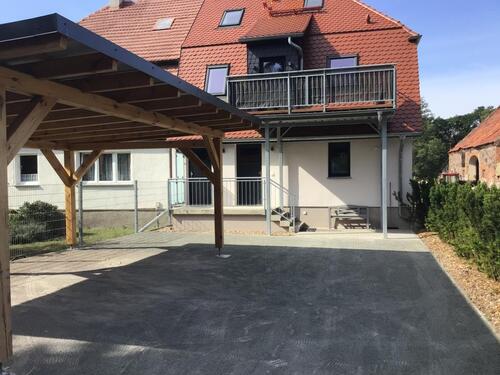 Foto - Doppelhaushälfte. Zwei Wohnungen.