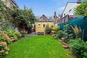 Foto - Backsteinhaus mit grünem Garten & Dachterrasse – provisionsfrei