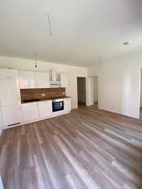 Foto - 2-Zimmer Neubau-Wohnung mit EBK, Terrasse und Garten