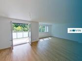 Foto - Lichtdurchflutete 3-Zimmer-Neubauwohnung mit offenem Küchenbereich und großem Balkon