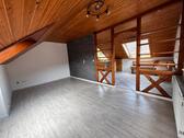 Foto - 3,5-Zimmer-Dachgeschosswohnung mit Gartenanteil