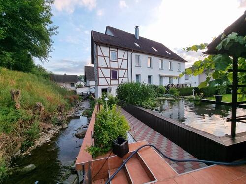 Foto - Großzügiges Zweifamilienhaus mit Einliegerwohnung & Traumgarten i