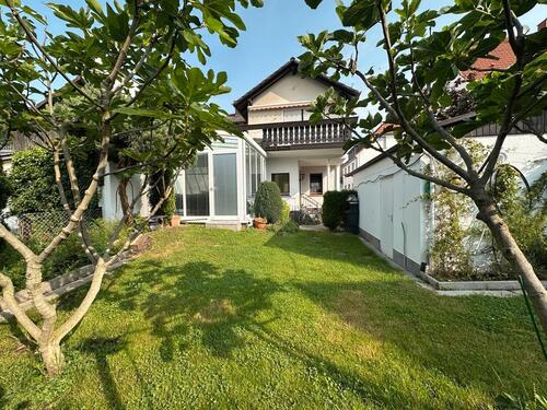 Foto - Gepflegte DHH mit Garage Wintergarten voll unterkellert