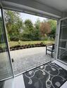 Foto - Souterrain-Wohnung mit großer Terrasse und Garten