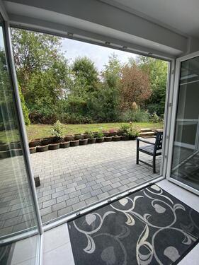 Foto - Souterrain-Wohnung mit großer Terrasse und Garten
