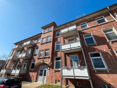 Foto - Moderner Grundriss mit geräumiger Wohnküche und Balkon