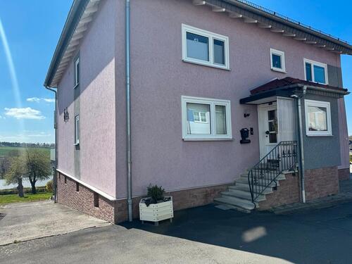 Foto - Etagenwohnung mit großem Garten und Saunabereich