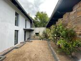 Foto - Einfamilienhaus mit Innenhof, Dachterrasse, Teich & Brunnen