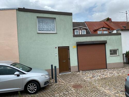 Foto - Grundstücke mit Einfamilienreihenhaus, Garage und Garten