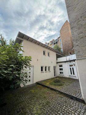 Foto - Zentrale Wohnung mit Garage und ruhiger Hoflage im Westend