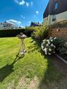 Foto - Moderne Gartenwohnung mit zwei TG Plätzen und Privatgarten