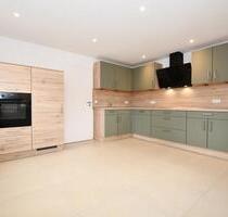 Wohnen mit Wohlfühlcharakter - Mietwohnung mit Balkon, Einbauküche und E-Ladestation in Altenoythe - Friesoythe