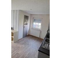 Zentrale Obergeschosswohnung im Zweifamilienhaus in Warsingsfehn - Moormerland
