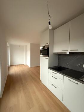 Foto - Moderne 1-Zimmer-Neubauwohnung mit großer Terrasse und Einbauküch