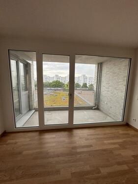 Foto - Helle Neubau-2-Zimmer-Wohnung mit Balkon, Fußbodenheizung & TG