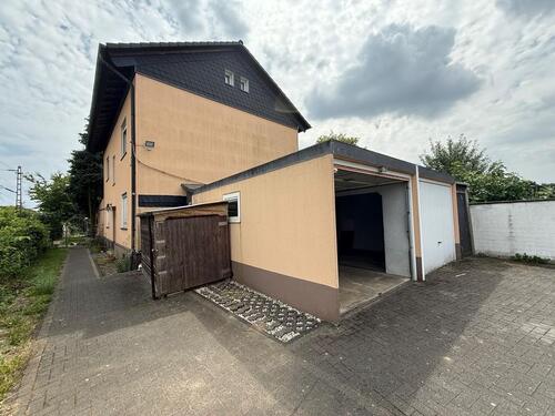 Foto - Zweifamilienhaus mit Garten, 2 Garagen & Kamin – Köln-Weiler