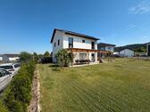Foto - Modernes Einfamilienhaus mit Carport