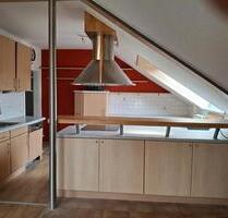 Helle Dachgeschosswohnung mit Balkon - Kalletal