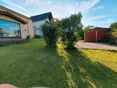 Foto - Eigentumswohnung 3,5 Zimmer Garten, Wintergarten und Stellplätze