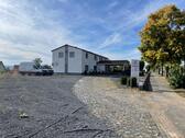 Foto - Mehrfamilienhaus + Gewerbeeinheit auf 2.343 m² Grundstück