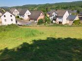 Foto - Sofort verfügbares und voll erschlossenes, sonniges Baugrundstück