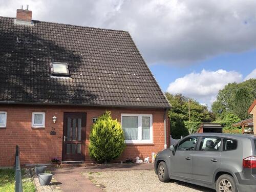 Foto - Selent: Doppelhaushälfte mit zwei Garagen