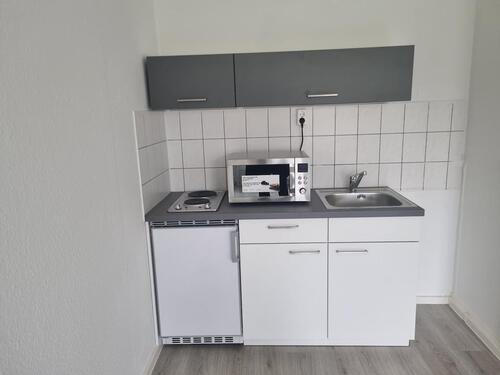 Foto - Singlewohnung mit Einbauküche im Erdgeschoss