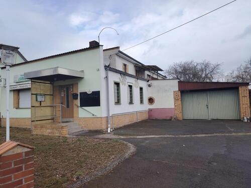 Foto - Haus mit Gewerbe und Grundstück