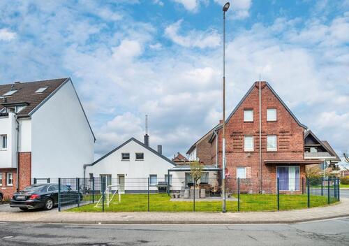 Foto - Ein-Zweifamilienhaus (mit Gewerbe)