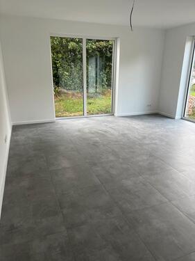 Foto - Moderne 4-Zimmer-Erdgeschosswohnung mit Garten und Garage