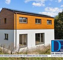 Einfamilienhaus mit großem Garten zum Erstbezug in idyllischer Lage von Brunnen-Niederarnbach