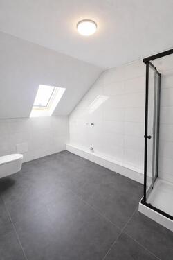 Foto - Erstbezug -Moderne und helle Dachgeschosswohnung -großer Terrasse