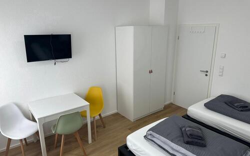 Foto - Gästezimmer mit TV, Internet, 2x EtagenduscheWC, Gästeküche, Waschmaschine und Trockner