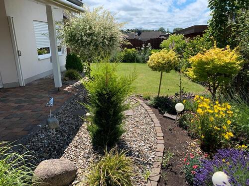 Foto - Helles Einfamilienhaus mit wunderschönem Garten in ruhiger Lage